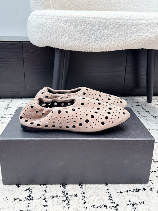 ALAIA 26S FLAT SLIP-ONS IN NUDE PINK SUEDE WITH OPENWORK PATTERN