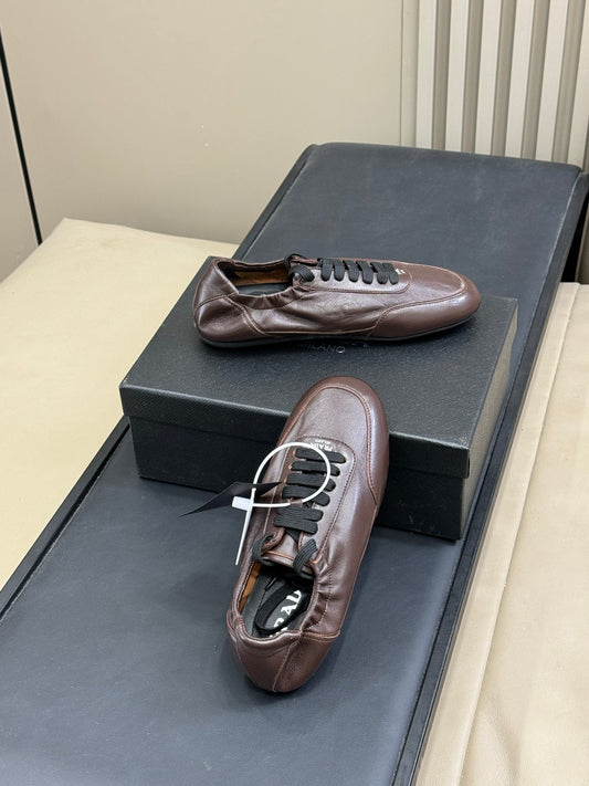 PRADA 25S COLLAPSE FLAT SHOES IN DARK BROWN CALFSKIN