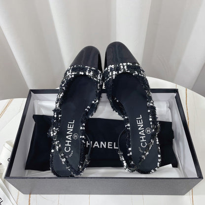 CHANEL 26S HIGH-HEEL SLINGBACKS 65 MM IN BLACK MIX WHITE TWEED