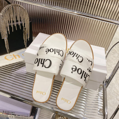 CHLOÉ WOODY SLIPPER IN WHITE MIX BLACK CANVAS