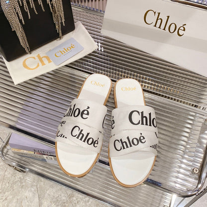 WOODY SLIPPER IN WHITE MIX BLACK CANVAS