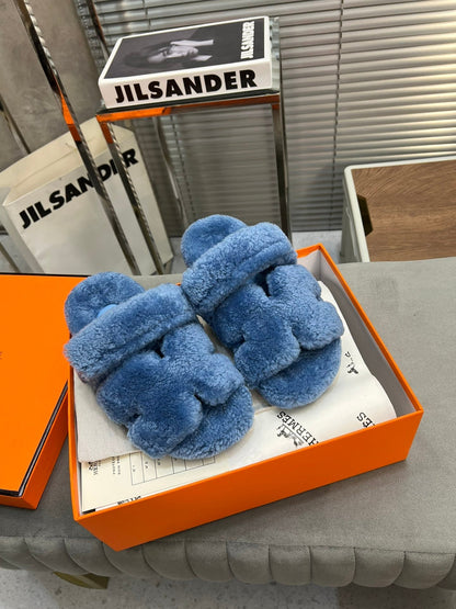 CHYPRE SLIPPERS IN AZURE BLUE LAMB WOOL