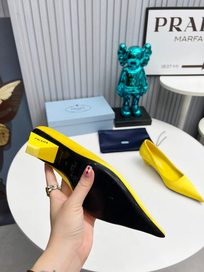 PRADA 26S POINTED TOE PUMPS 40MM IN YELLOW SATIN