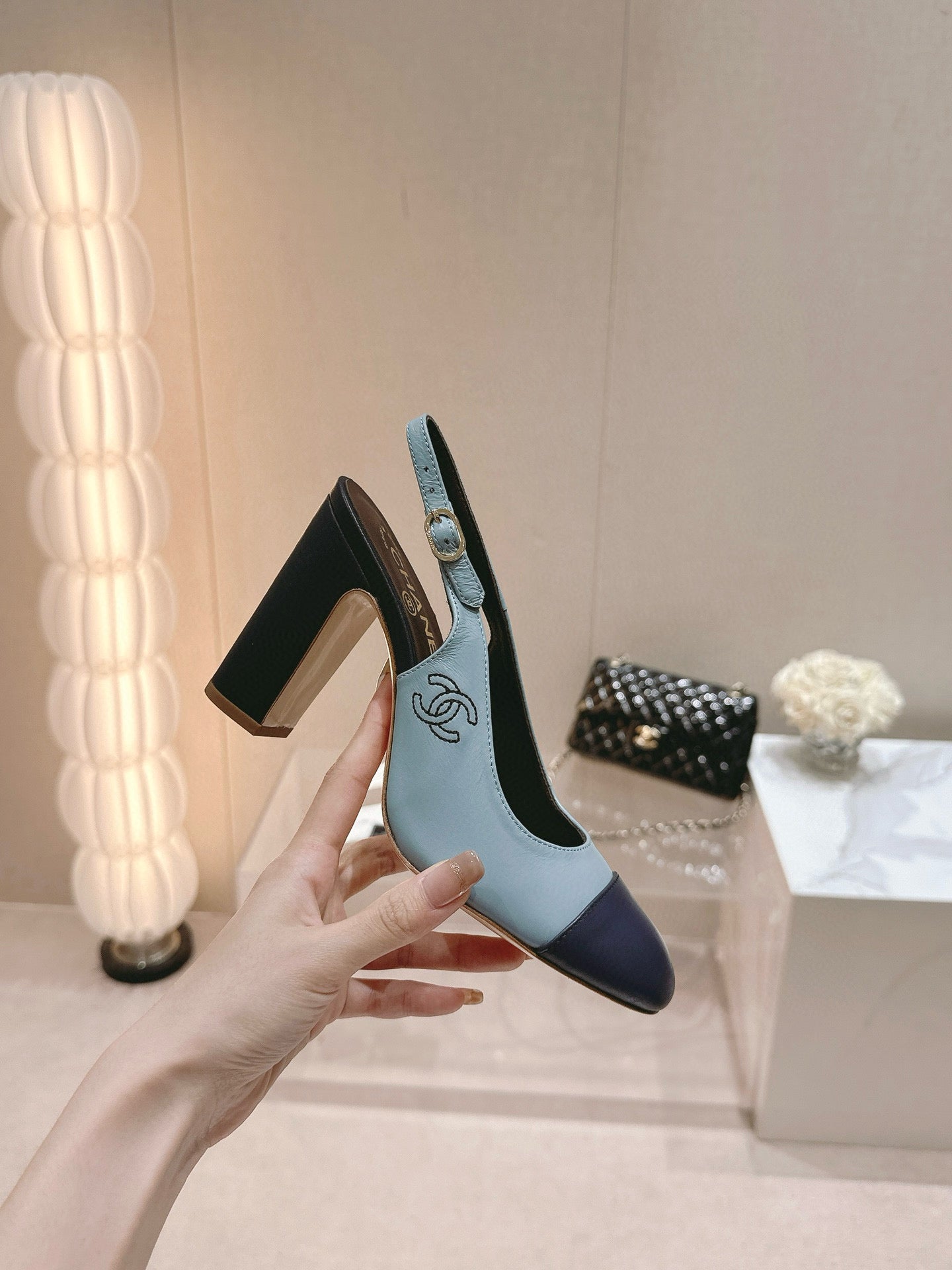 CC SLINGBACK PUMPS IN BLUE AND BLACK CALFSKIN