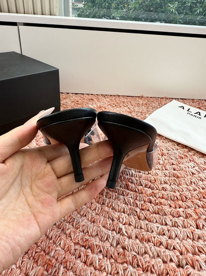 ALAIA 26S MULE HEELS IN BLACK LAMBSKIN AND TRANSPARENT PVC