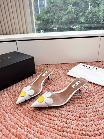 ALAIA 26S POINTED-TOE MULE HEELS IN WHITE LAMBSKIN AND TRANSPARENT PVC