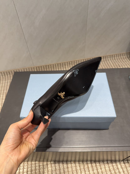 PRADA 26S POINTED TOE PUMPS 55MM IN BLACK SHEEPSKIN WITH LOGO