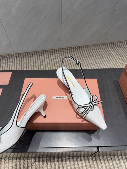 MIUMIU 26S SLINGBACK 55MM IN WHITE AND BLACK CALFSKIN WITH BOW