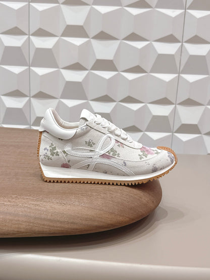 LOEWE 26S FLOW RUNNER SNEAKER IN WHITE FLORAL PATTERN SUEDE AND CALFSKIN