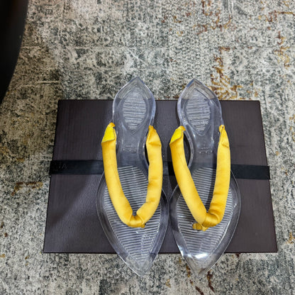 ALAIA 26S THONG SANDALS IN YELLOW SATIN AND TRANSPARENT PVC