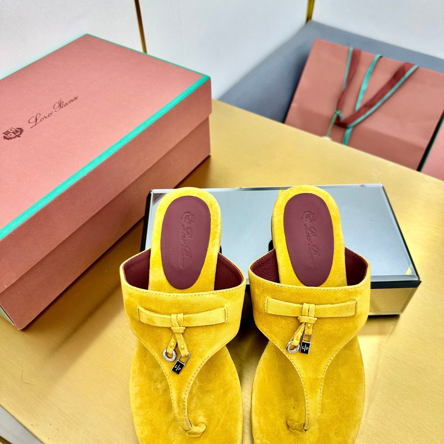 FLIP FLOPS IN YELLOW SUEDE AND HARDWARE SILVER