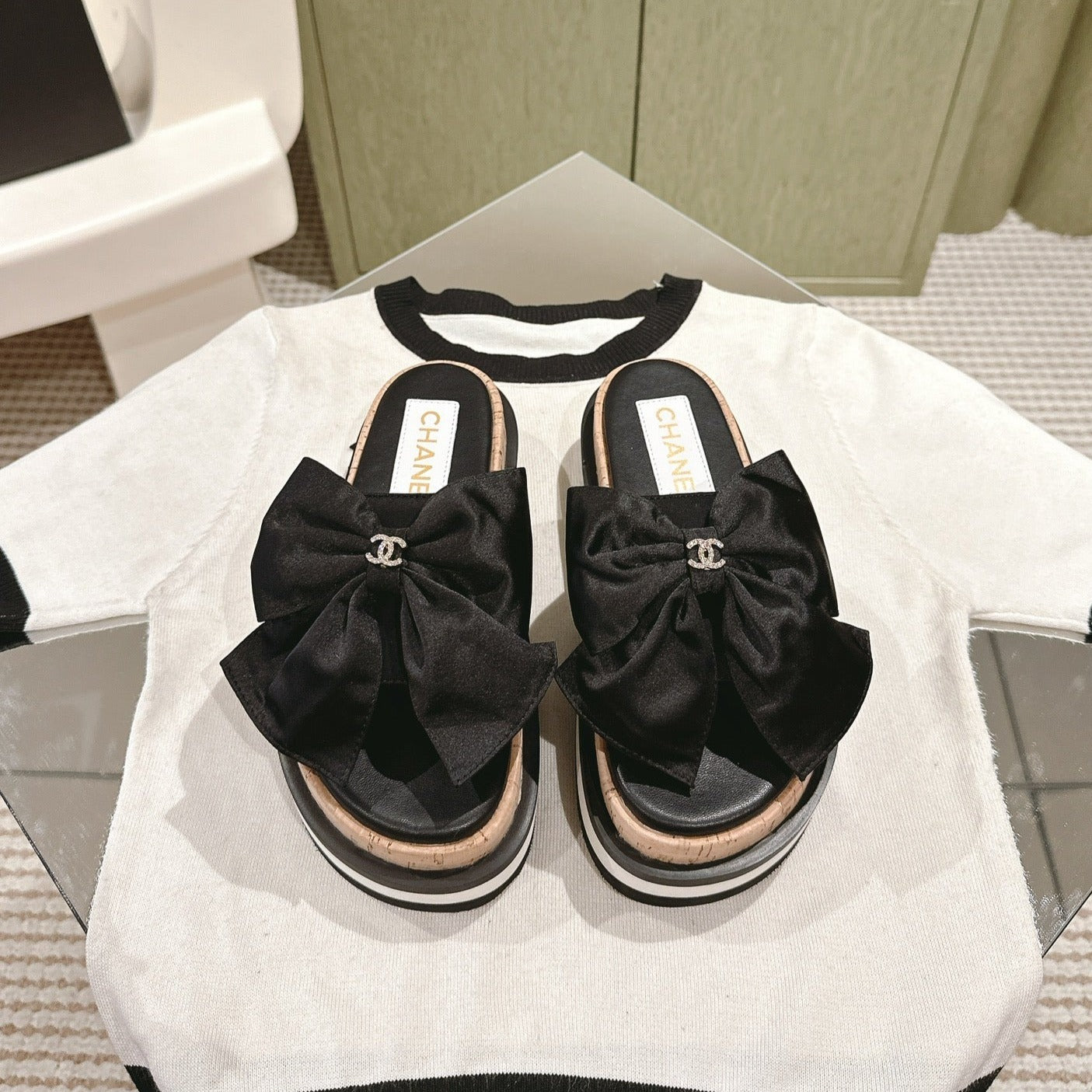 CC SLIPPERS WITH SILK BOW IN BLACK COWHIDE
