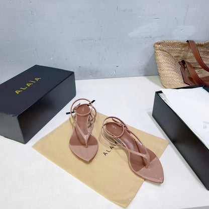 ALAIA 26S THONG SANDALS IN NUDE CALFSKIN