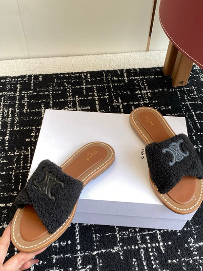 CELINE 26S TRIOMPHE FLAT SLIDES IN BLACK WOOL