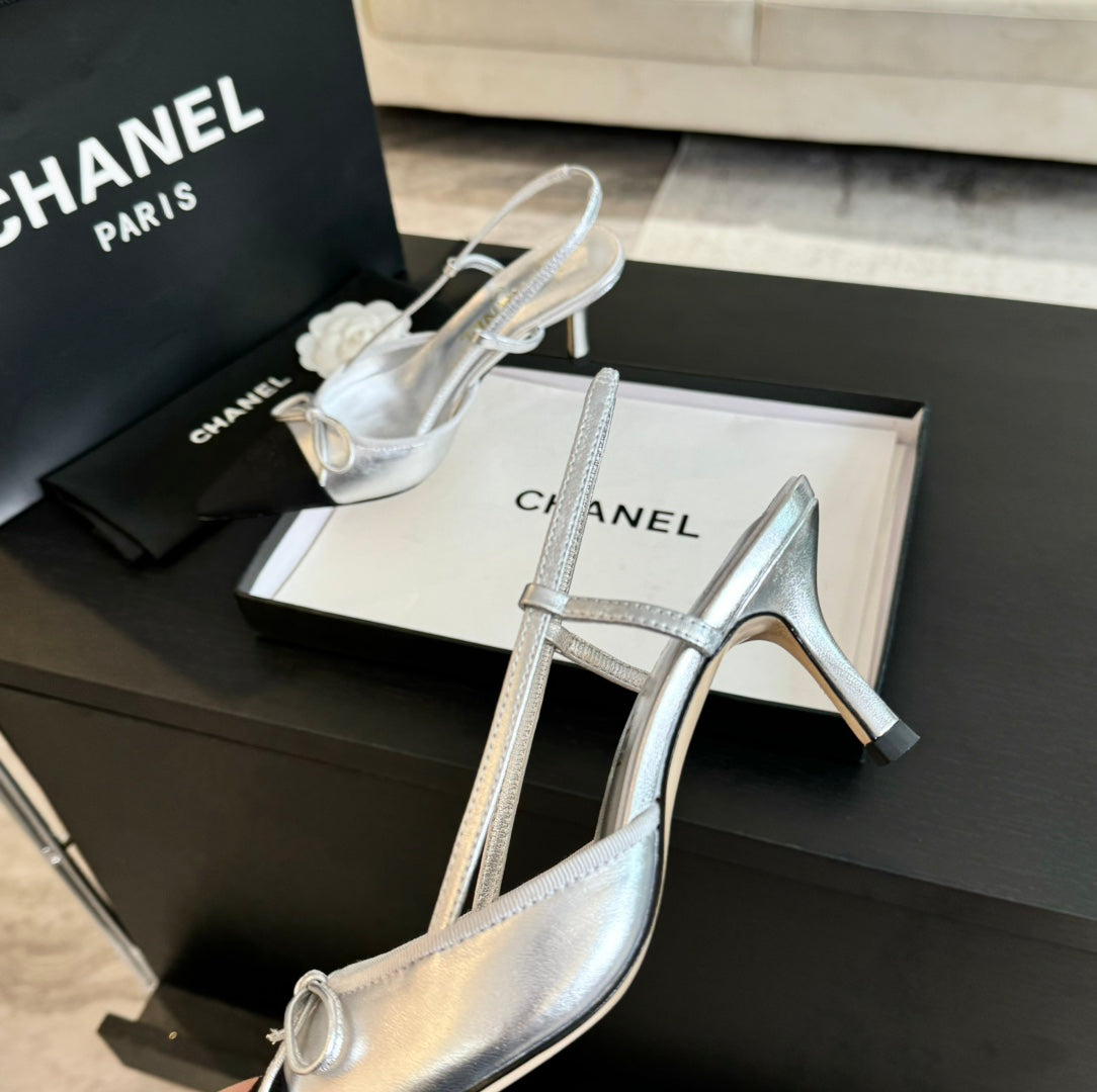 SLINGBACK WITH BOW IN SILVER MIX BLACK LAMBSKIN