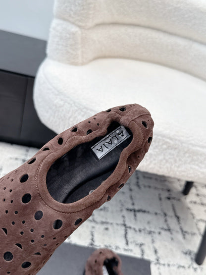 ALAIA 26S FLAT SLIP-ONS IN DARK BROWN SUEDE WITH OPENWORK PATTERN