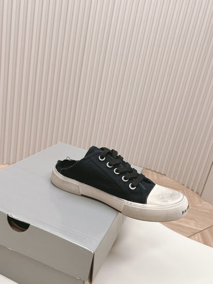 PARIS MULES IN BLACK DESTROYED DENIM AND RUBBER