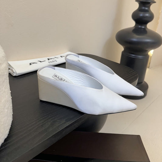 ALAIA HIGH MULES 25S IN WHITE SATIN