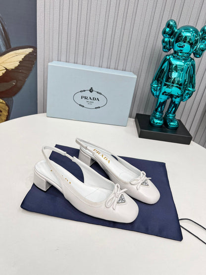 PRADA 26S ROUND TOE SLINGBACK PUMPS 40MM IN WHITE CALFSKIN WITH BOW