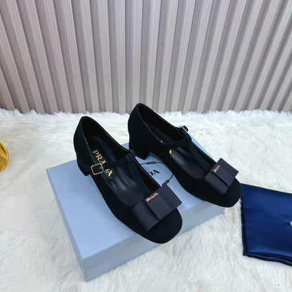 PRADA 26S T-STRAP MARY JANE PUMPS 40MM IN BLACK SUEDE WITH BOW