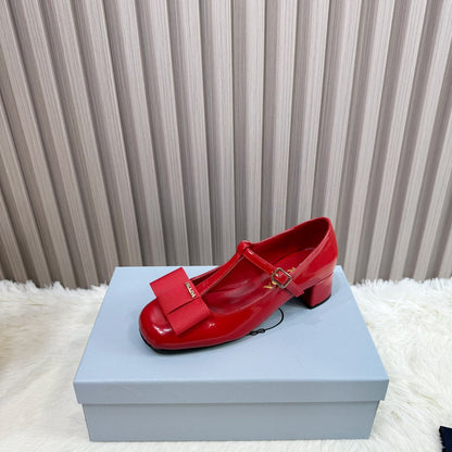 PRADA 26S T-STRAP MARY JANE PUMPS 40MM IN RED PATENT CALFSKIN WITH BOW