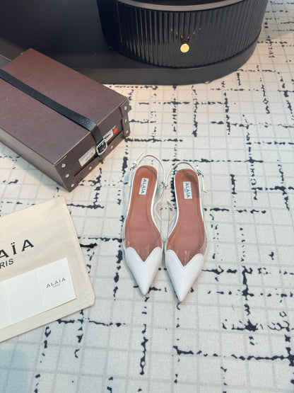 ALAIA FLAT SLINGBACK IN WHITE PATENT CALFSKIN AND FILM