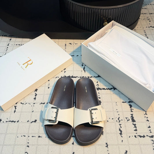 THE ROW 26S BUCKLE SLIDE SANDALS IN WHITE CALFSKIN