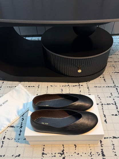 THE ROW 26S CLASSIC BALLET FLATS IN BLACK CALFSKIN