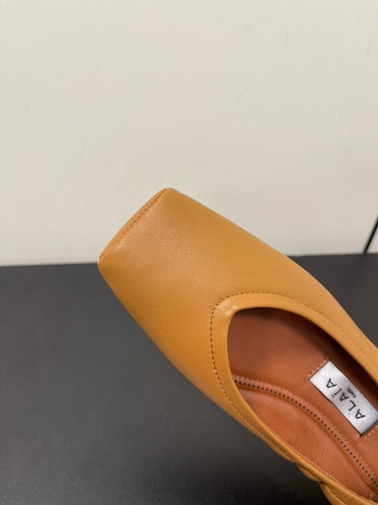 ALAIA BALLET FLATS IN COPPER BROWN SMOOTH CALFSKIN
