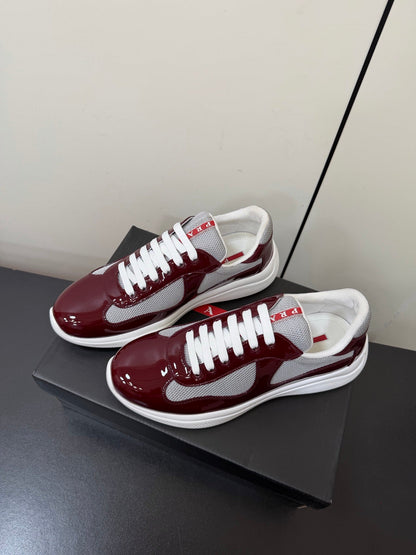 PRADA 26S SNEAKERS IN BURGUNDY RED PATENT CALFSKIN AND WHITE MESH