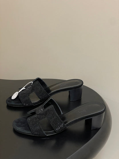 HM 25S ORAN HIGH‑HEEL SANDAL 50 MM IN BLACK LAMBSKIN WITH STONE DETAILS