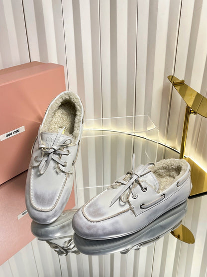 MIUMIU 26S FUR BOAT SHOES IN LIGHT GRAY CALFSKIN