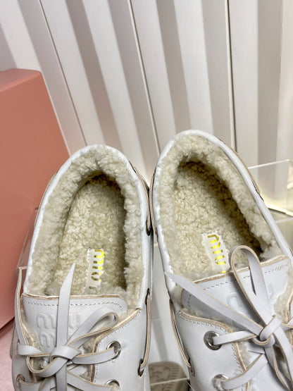 MIUMIU 26S FUR BOAT SHOES IN LIGHT GRAY CALFSKIN