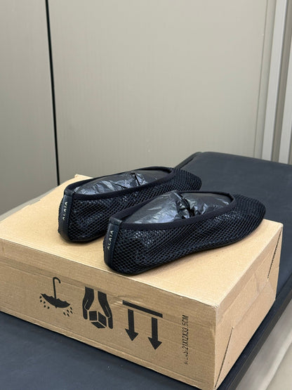 ALAIA FISHNET MESH BALLET FLATS 25S IN BLACK FABRIC