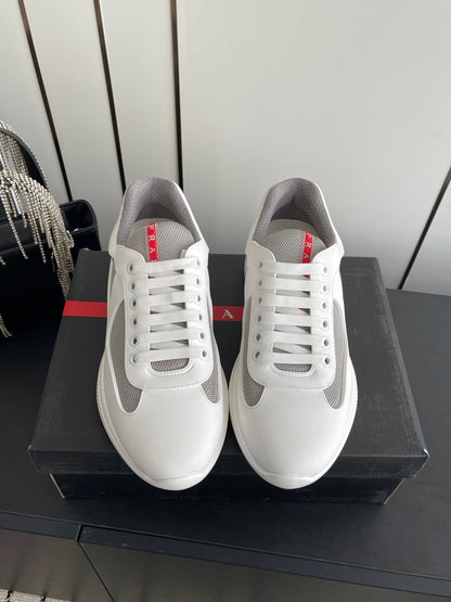 PRADA 26S AMERICA CUP SNEAKERS IN WHITE SOFT RUBBER AND BIKE FABRIC