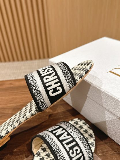 DIOR 26S D-CLUB FLAT SLIDES IN BLACK AND WHITE HOUNDSTOOTH