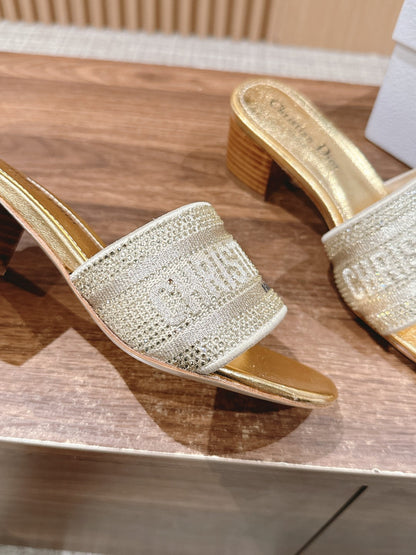 DIOR 26S D-CLUB EMBROIDERED HEELED SLIDES IN GOLD