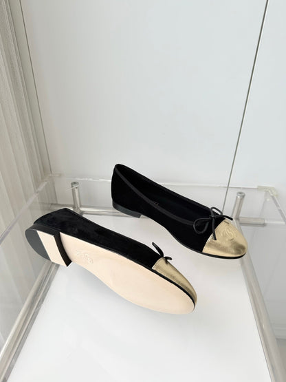 CHANEL 26S BALLET FLATS IN BLACK SUEDE WITH GOLD TOE CAP AND BOW
