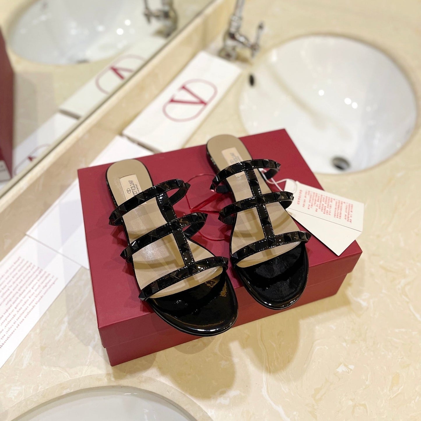 VALENTINO 26S ROCKSTUD CAGED SANDALS IN BLACK PATENT CALFSKIN