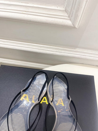 ALAIA 26S POINTED-TOE THONG SANDALS IN BLACK SATIN AND TRANSPARENT PVC